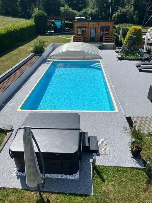 Chalet 2 Personnes Avec Jacuzzi Et Piscine Saisonniere Partagee Corcieux 外观 照片